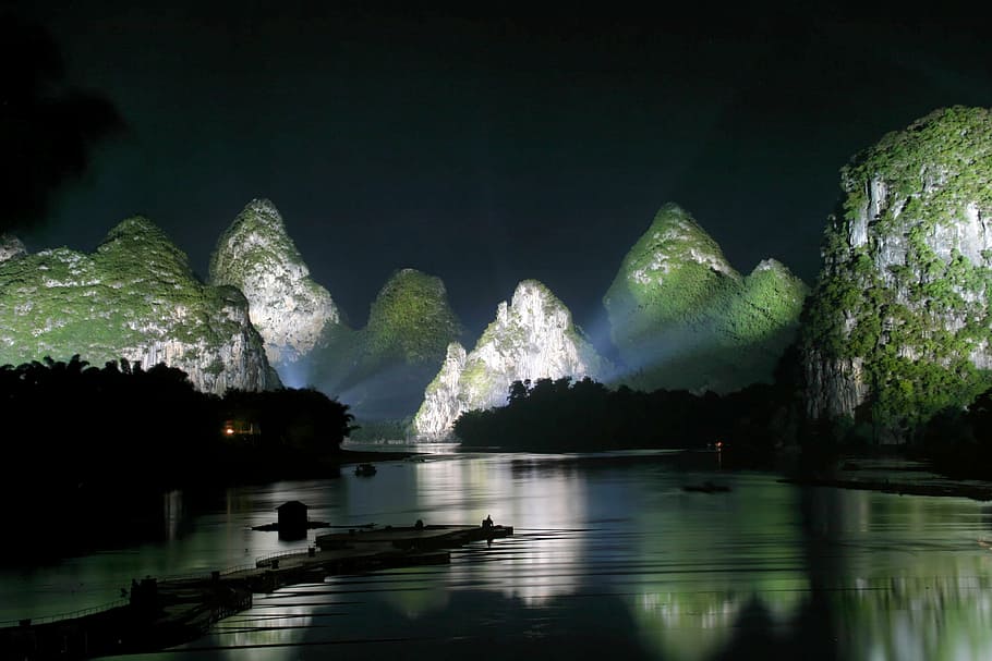 calm body of water with silhouette of island at nighttime, guilin HD wallpaper