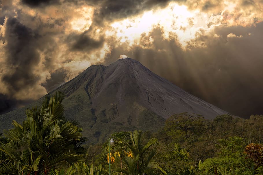 brown mountain under cloudy sky, costa rica, volcano, landscape