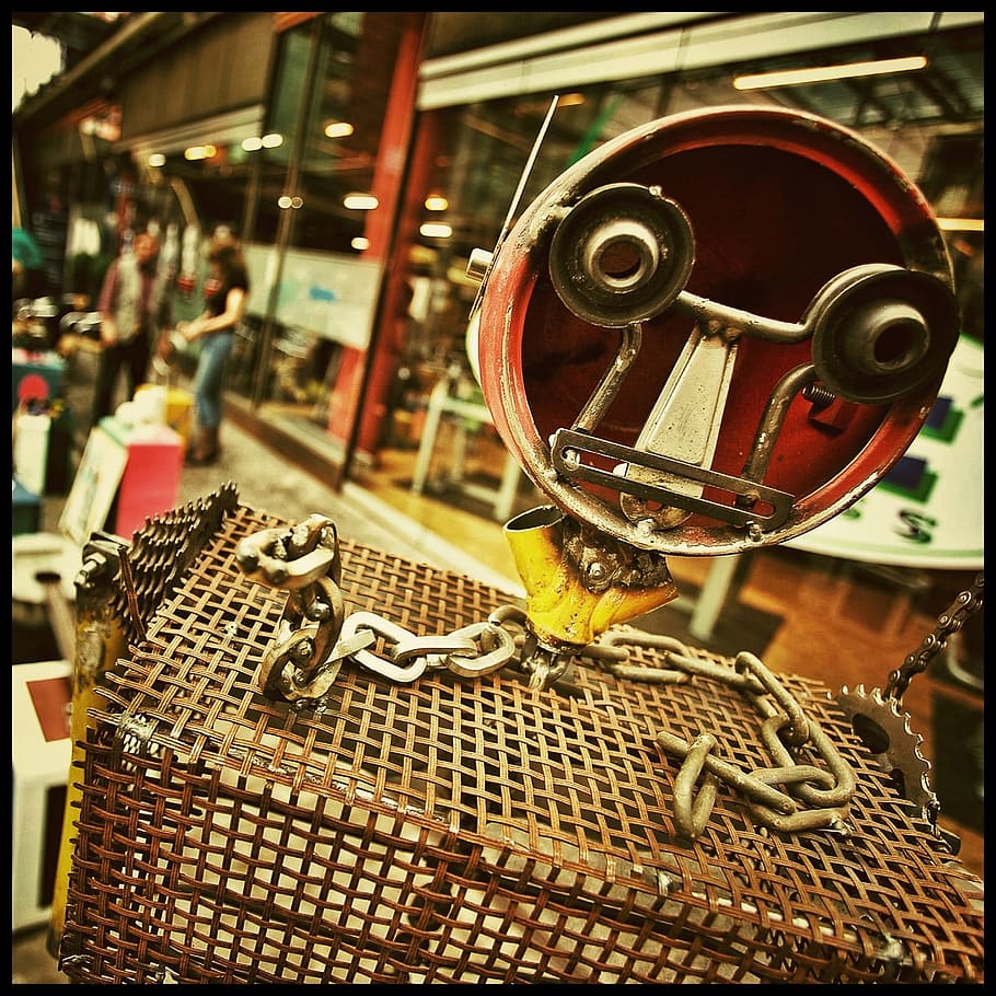 metal, scrap, junk, garbage, focus on foreground, incidental people HD wallpaper