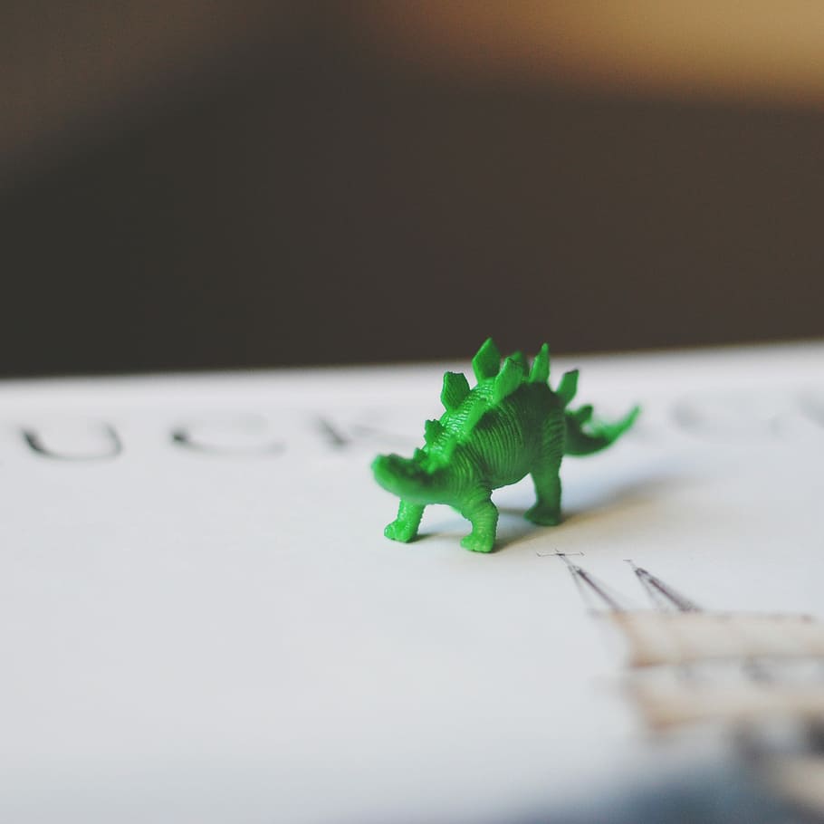 selective focus photography of green dinosaur toy, model, figure HD wallpaper