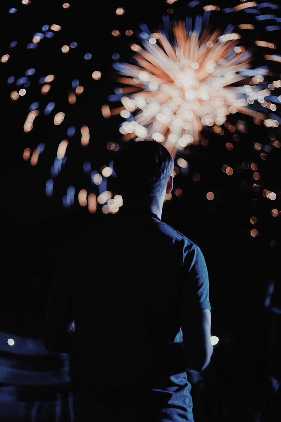 man looking at the fireworks, man watching fireworks during night time HD wallpaper