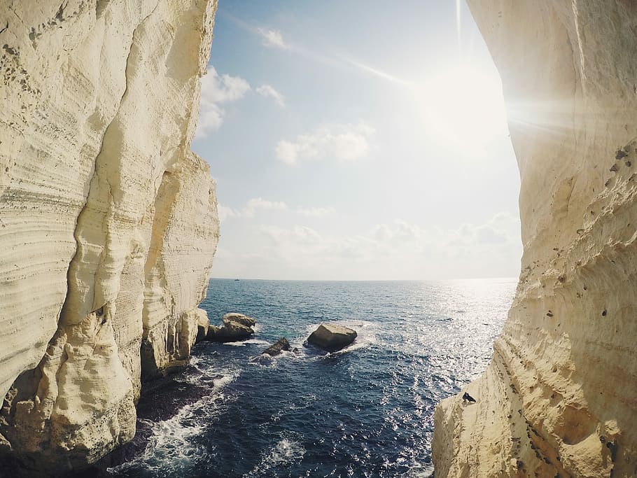 photo of sea and rocks, landscape photography of ocean, cave HD wallpaper