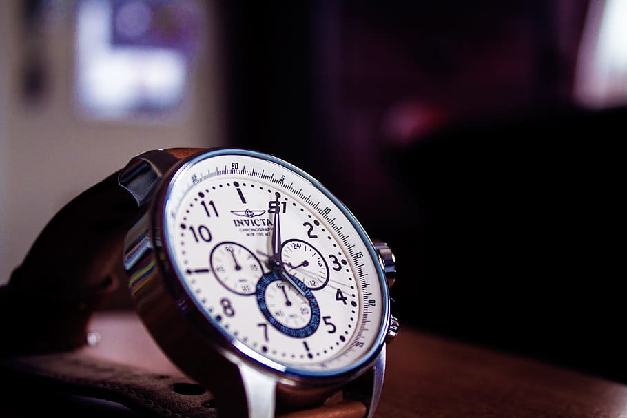 macro shot photography of round silver-colored chronograph watch HD wallpaper