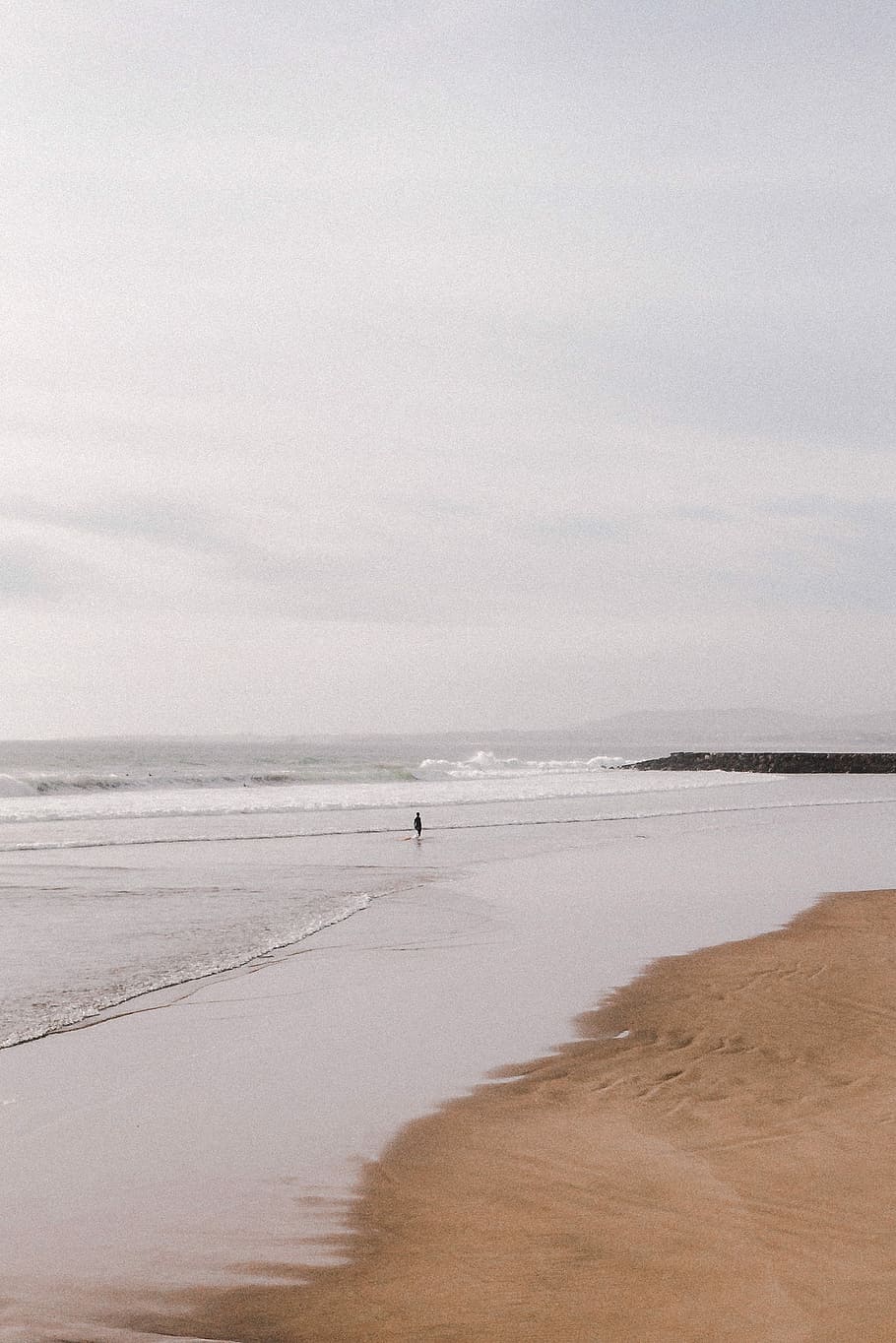 person at the seashore under gray sky, silhouette of person standing on seashore HD wallpaper