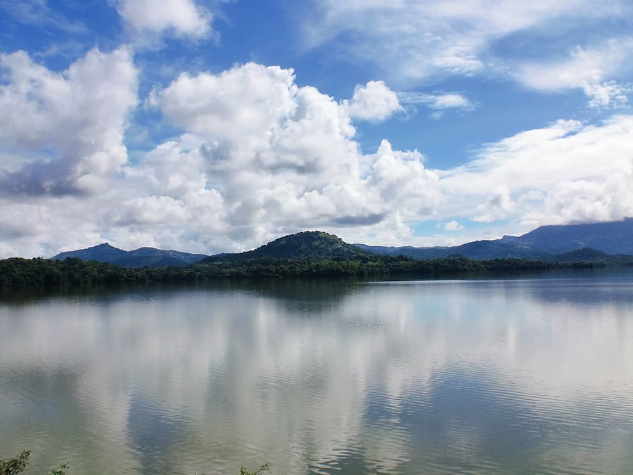 mountains between blue and white cloudy sky and calm lake, clouds HD wallpaper