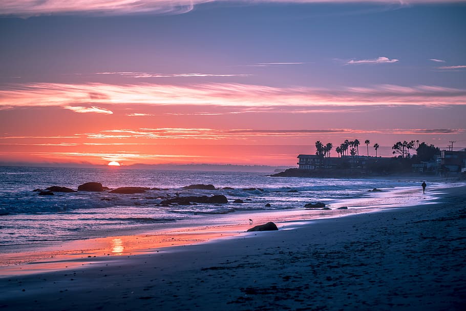 island during golden hour, sea near tree and house, water, sand HD wallpaper