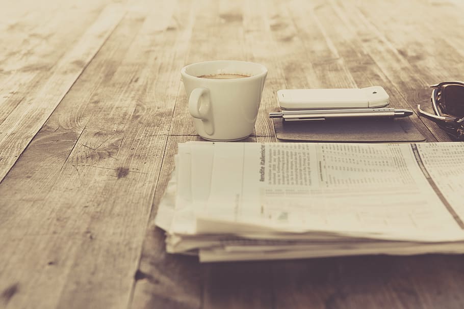 gray newspaper beside white coffee cup, document, top, brown