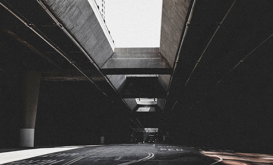 grayscale photo of empty concrete road with concrete long bridge HD wallpaper