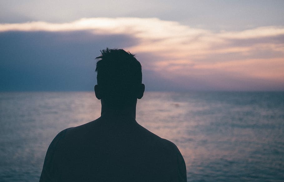 silhouette photography of man standing near sea, silhouette photo of man during sunset HD wallpaper