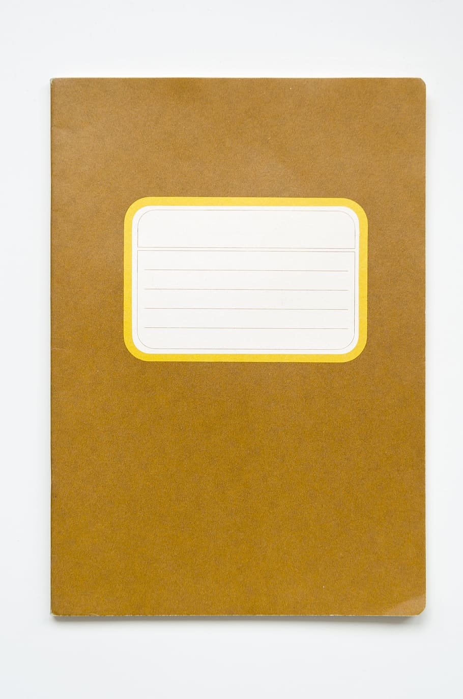 brown folder on white surface, notebook, copybook, exercise book HD wallpaper