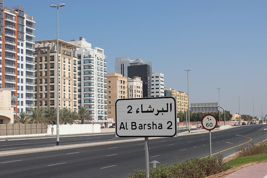 dubai, city, sign, communication, road sign, text, architecture HD wallpaper