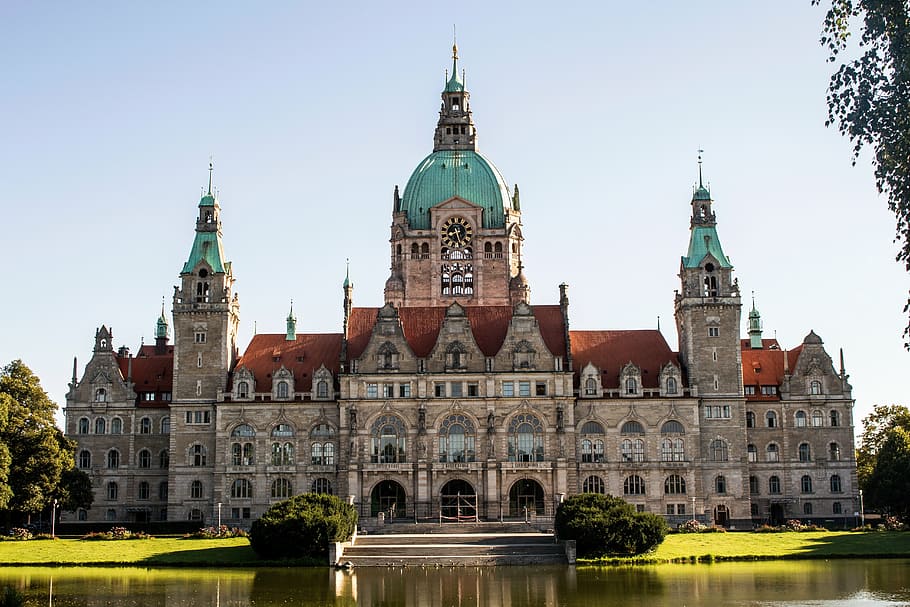 brown and red concrete cathedral, hannover, city hall, germany