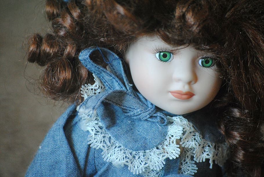 brown-haired doll wearing blue dress, porcelain, antique, vintage