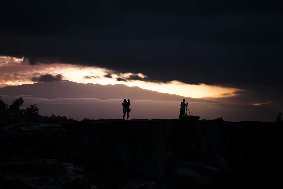 silhouette photo of woman carrying baby, silhouette of woman carrying baby during golden hour HD wallpaper