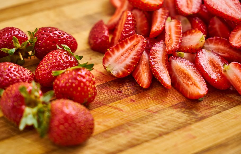 sliced strawberries on top of wood, strawberry, fruit, red HD wallpaper