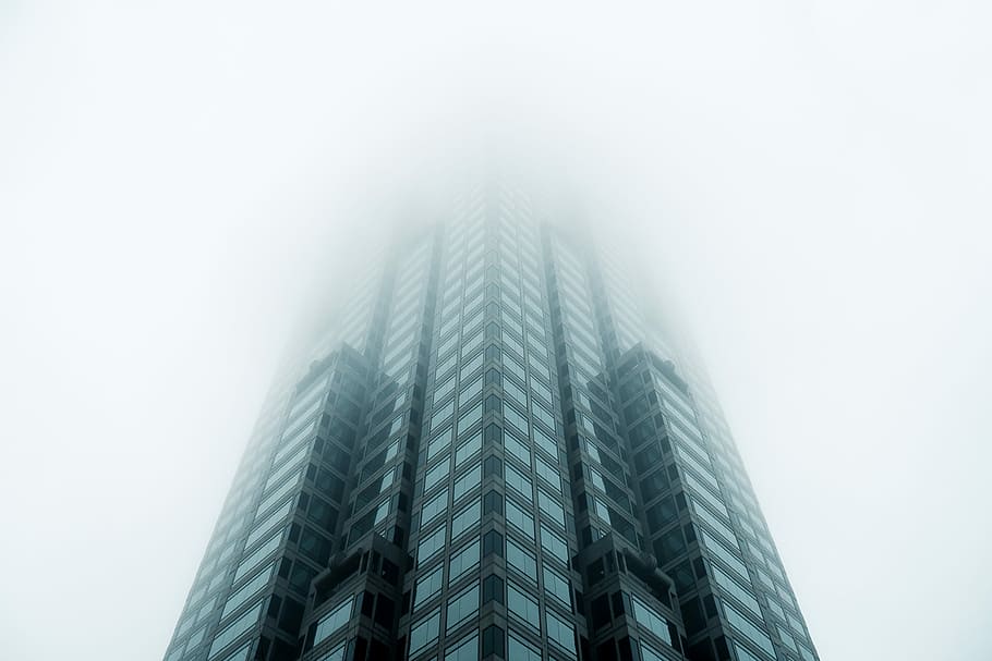 black high-rise building covered with fog, worm's eye view photo of high-rise building HD wallpaper