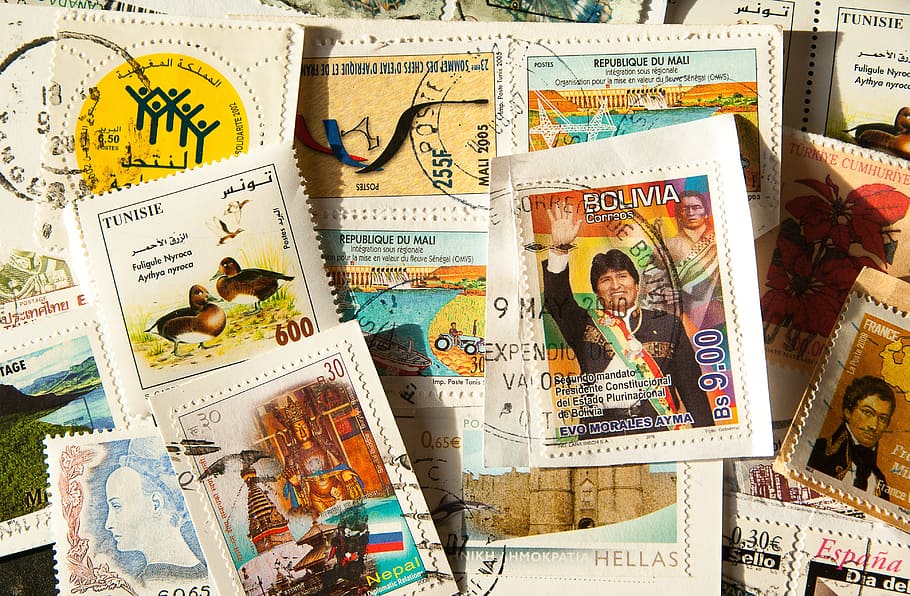 pile of books, stamps, philately, post, mail, collection, text HD wallpaper