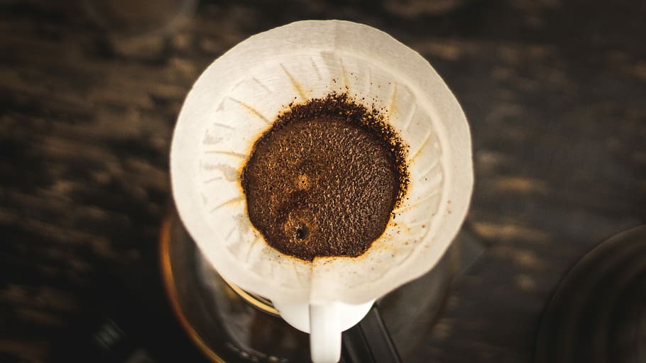 white coffee strainer selective focus photography, closeup photography of filtering coffee HD wallpaper