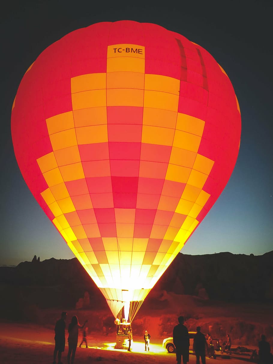 HD wallpaper: group of people looking on red and yellow hot air balloon,  lighting | Wallpaper Flare