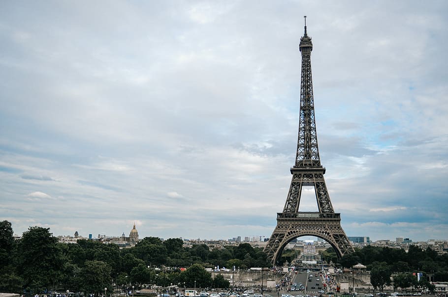 Eiffel Tower under cloudy blue sky, landmark, monument, structure HD wallpaper