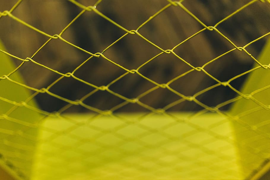 Close-ups of yellow wire netting, closeup, mesh, enclosure, cage