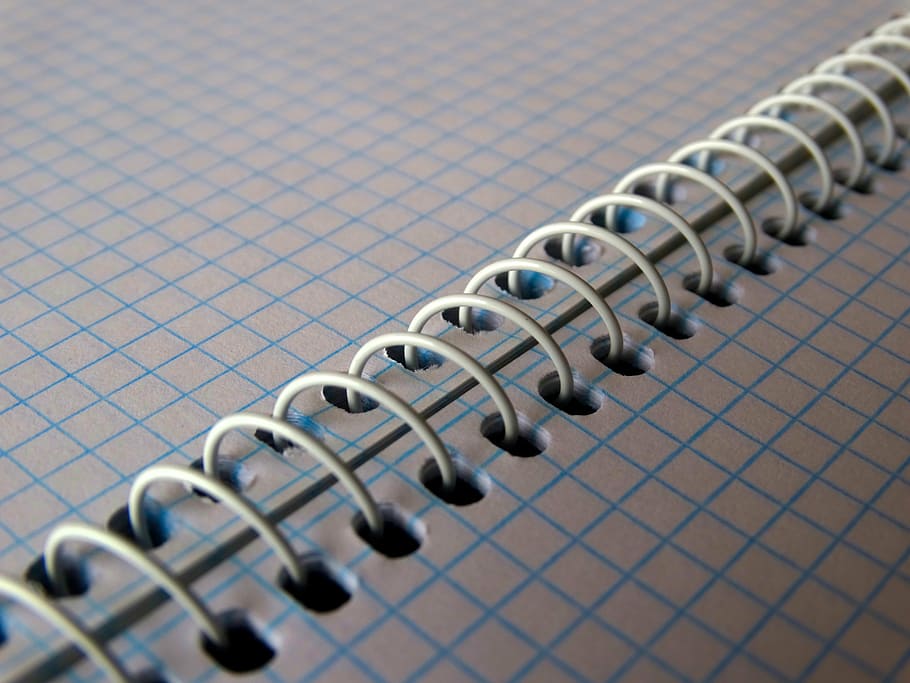 shallow focus photography of spiral spring, issue, spiral notebook HD wallpaper