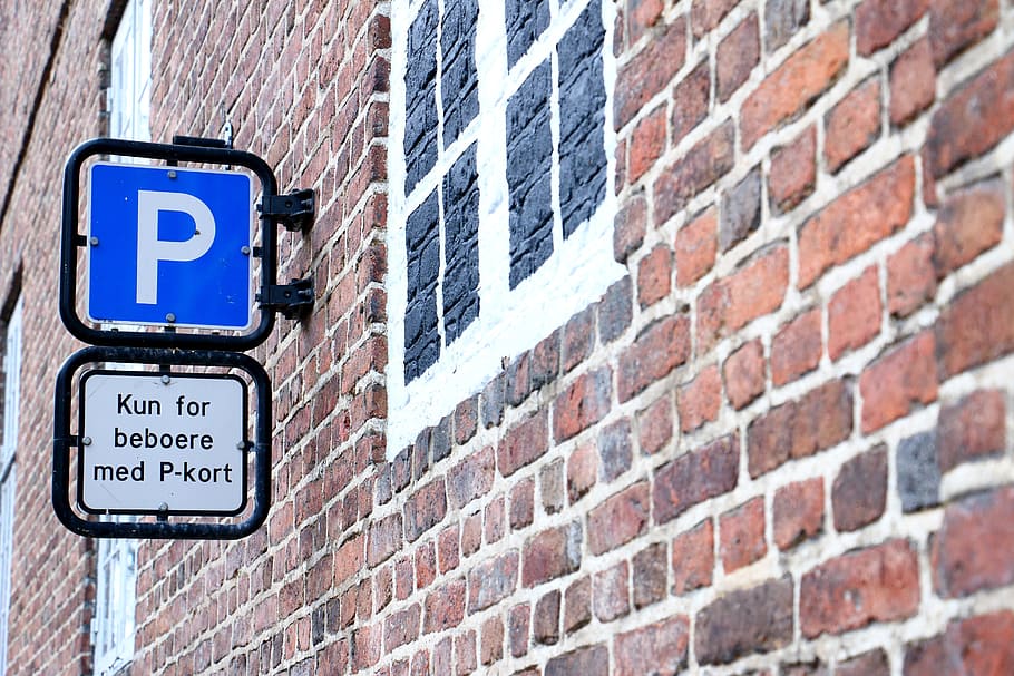 wall, parking space, sign, window, brick, brick wall, architecture HD wallpaper