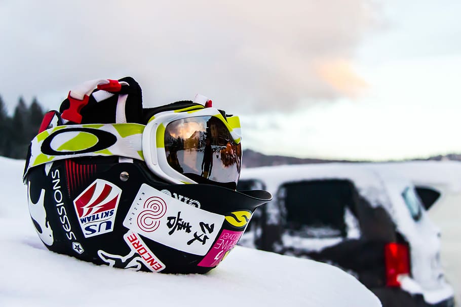 black and multicolored helmet on snow, black and white half helmet with snow goggles HD wallpaper