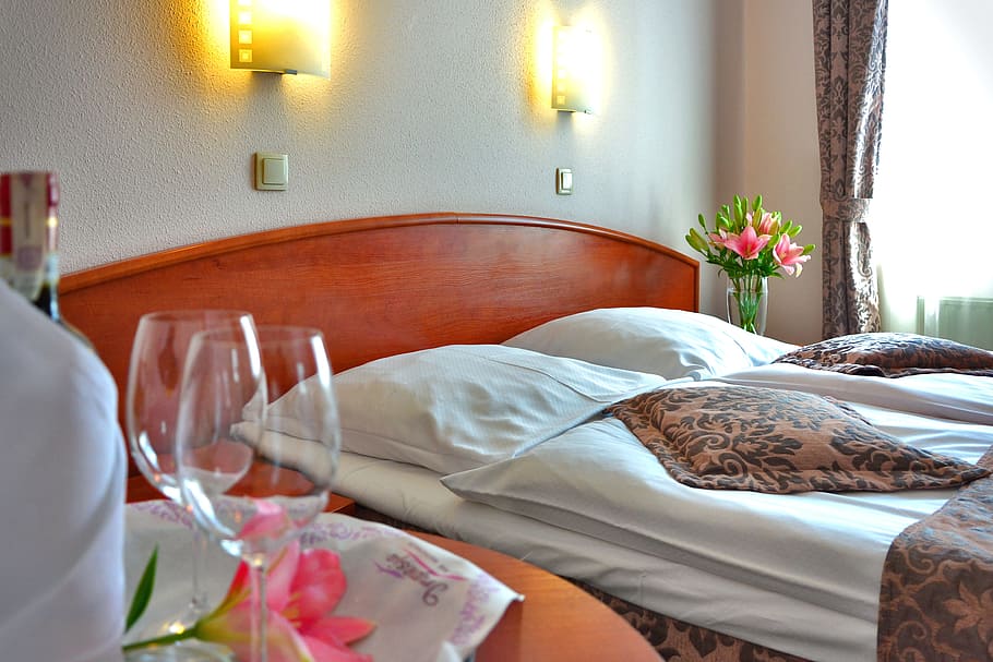 two wine glass near brown wooden bedroom set, hotel room, romantic encounter, HD wallpaper
