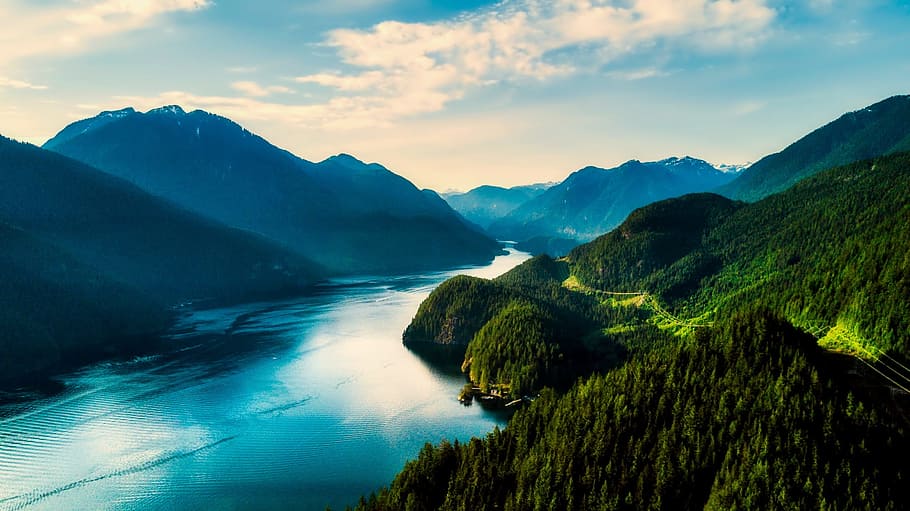 aerial photography of mountain and body of water during daytime HD wallpaper