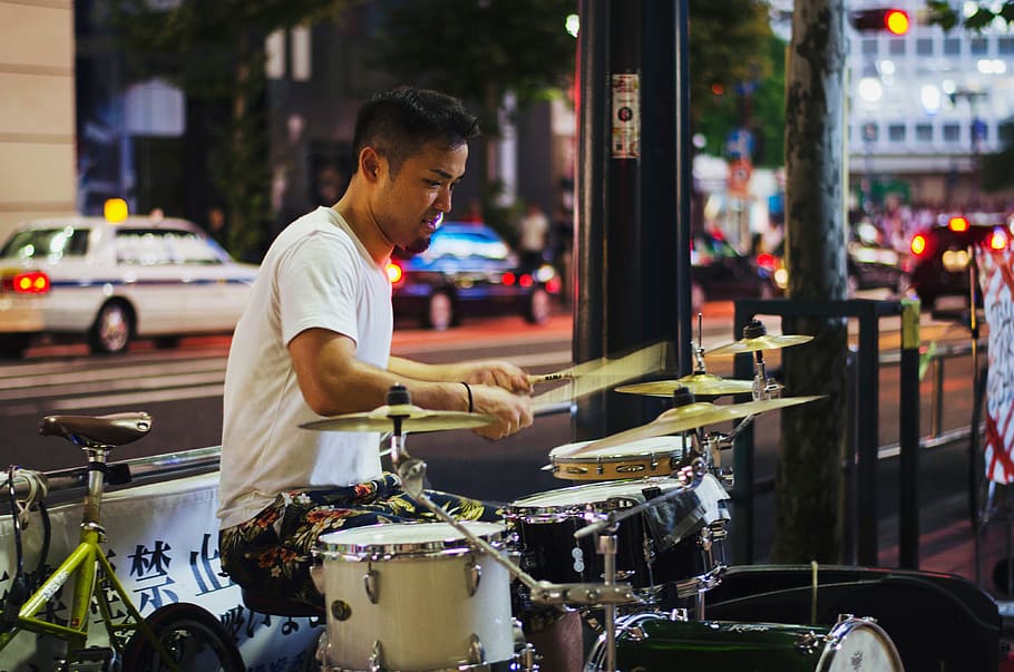 man playing drums near road at daytime, set, musical, instrument HD wallpaper