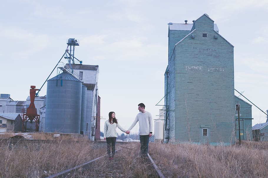 building, structure, plant, people, couple, man, woman, holding hands HD wallpaper