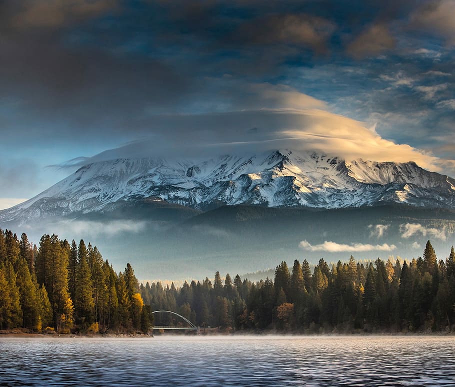 landscape photography of trees and body of water near snow covered mountain at daytime, landscape photography of mountain and pine trees HD wallpaper