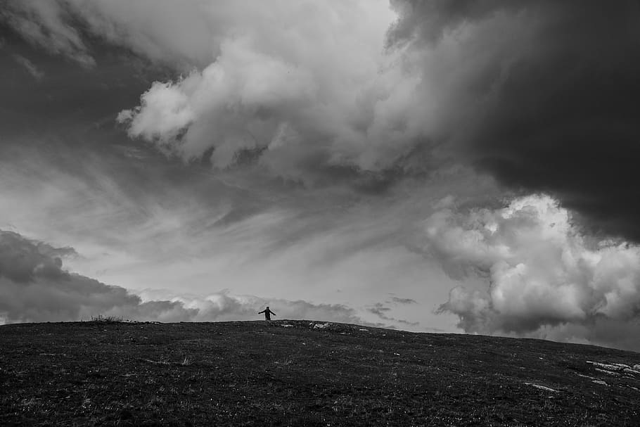 grass, highland, mountain, clouds, sky, black and white, people HD wallpaper