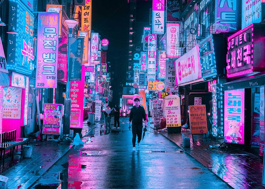 Juan, South Korea, man walking on grey concrete road, city, night