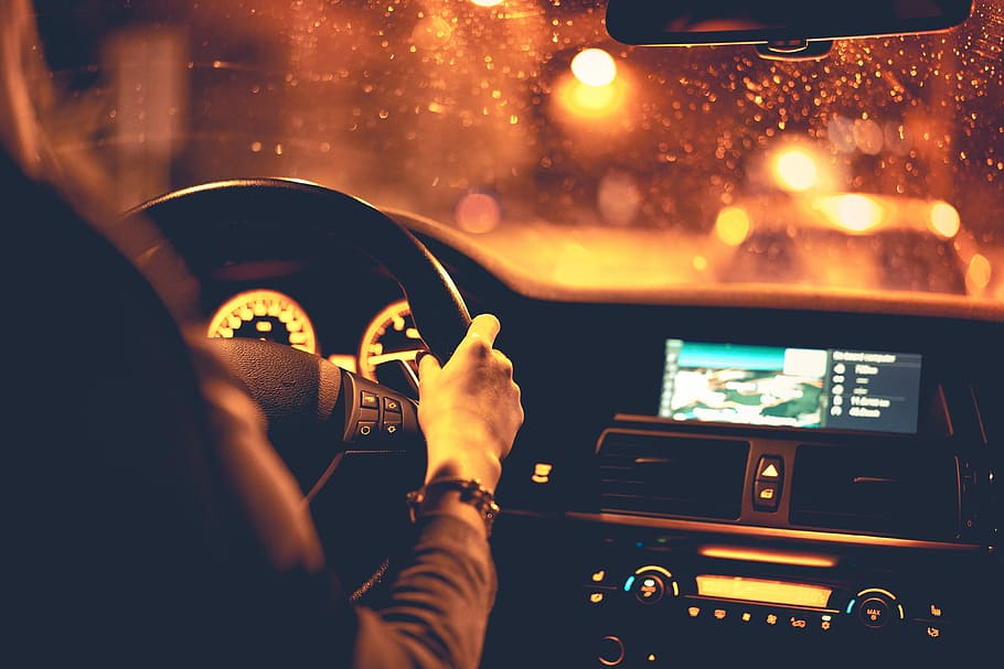 Woman Driving at Night, city, dashboard, driver, orange, people, HD wallpaper
