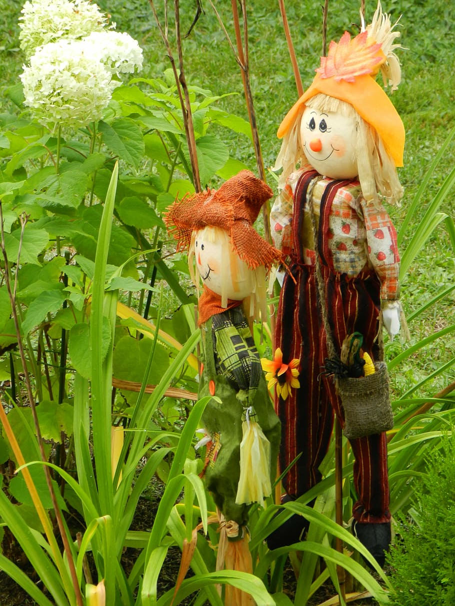 doll, fall, flower bed, flowers, representation, plant, nature HD wallpaper
