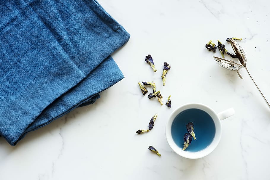 blue fabric near white cup with blue beverage, flower, wallpaper HD wallpaper