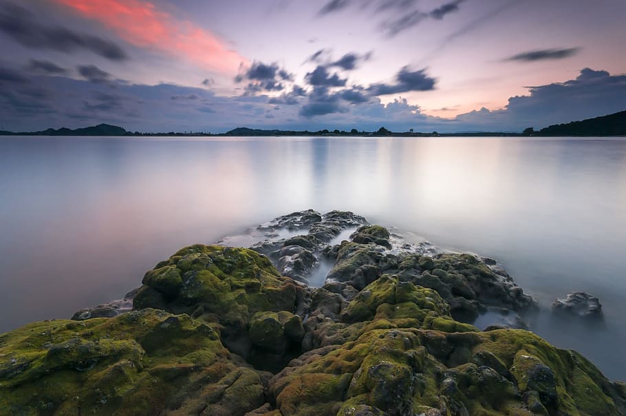 Green Mountains in Front of Body of Water, calm, clouds, dawn HD wallpaper