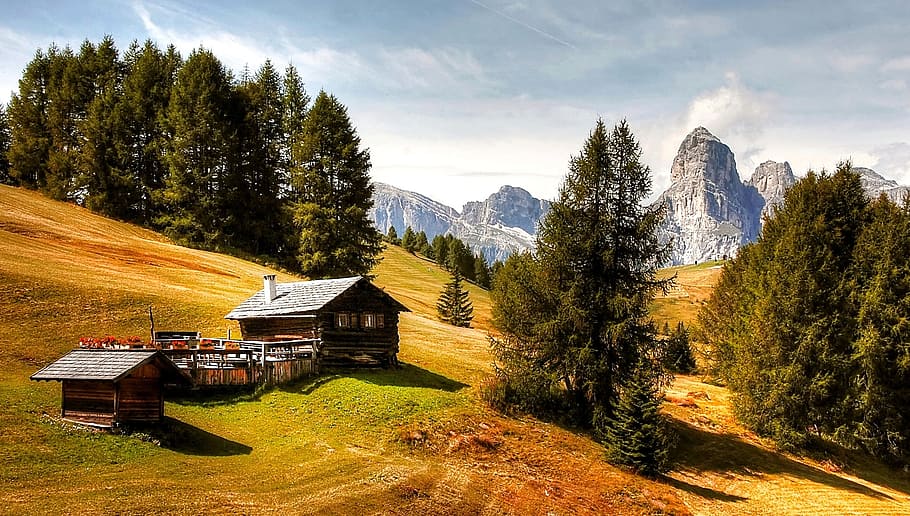 brown and gray house on rural place, alta badia, dolomites, nature