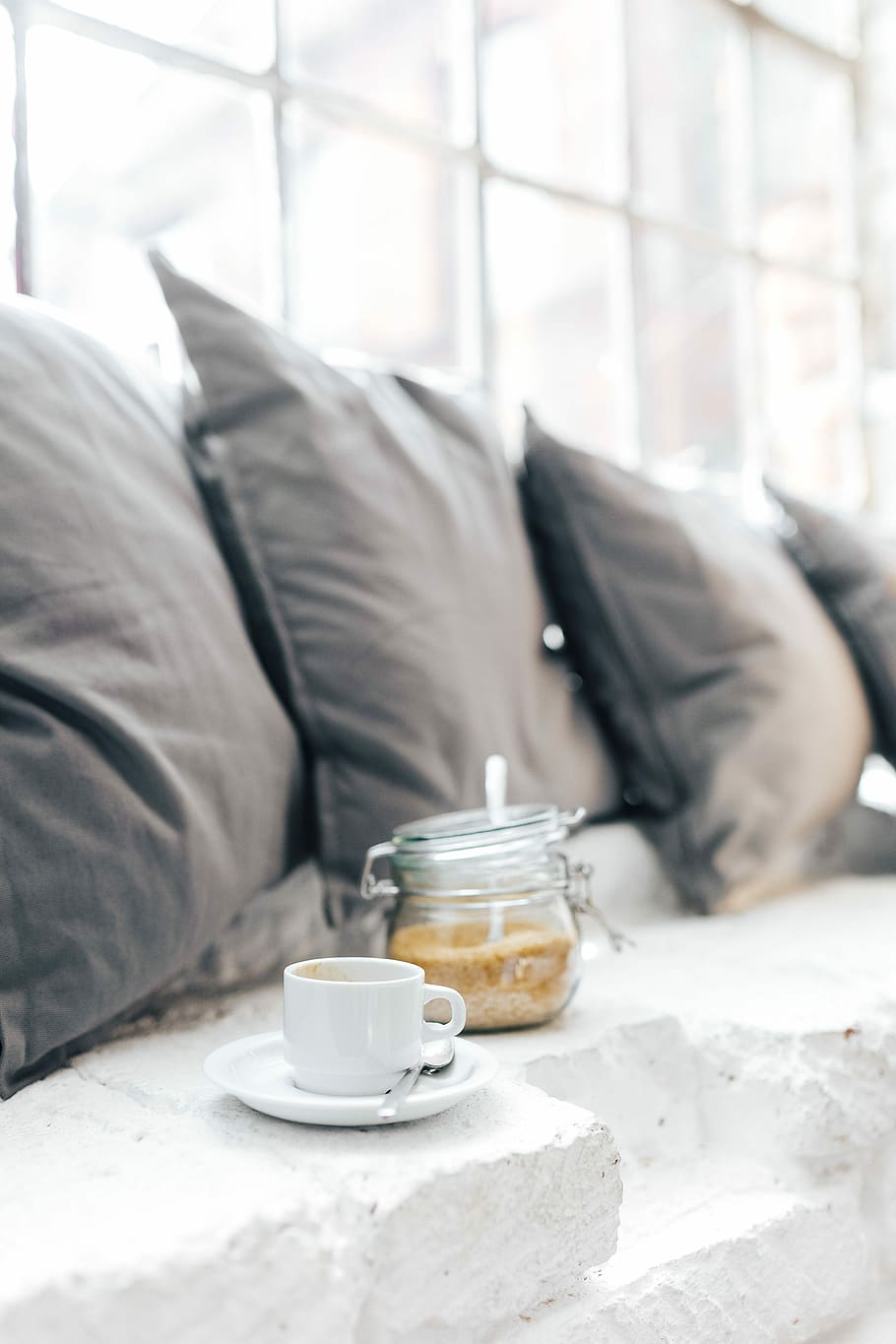 Morning coffee with a jar of brown sugar, spices, breakfast, pillows