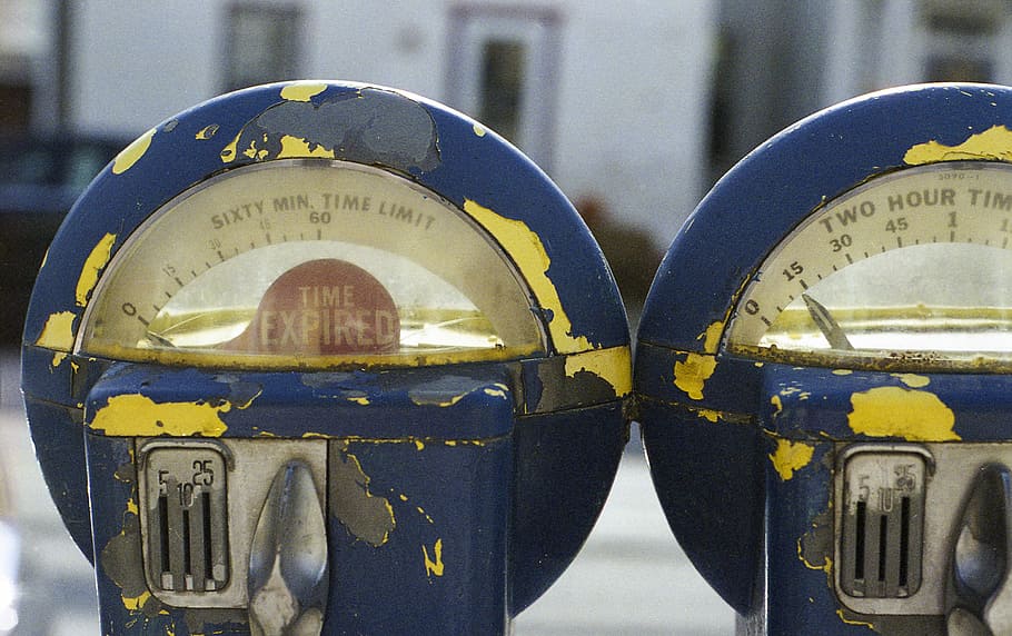 two round blue-gray-and-yellow analog devices, closeup photo of two blue metal tools HD wallpaper