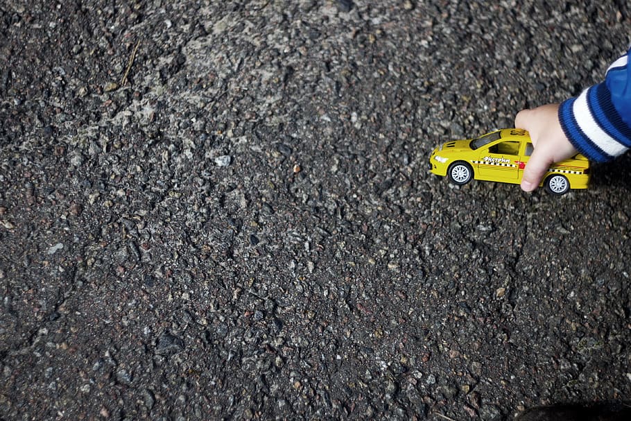 background, toy, machine, asphalt, one person, human body part HD wallpaper