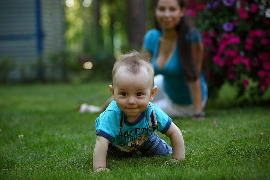 shallow focus photography of boy crawling on grass during daytime, HD wallpaper
