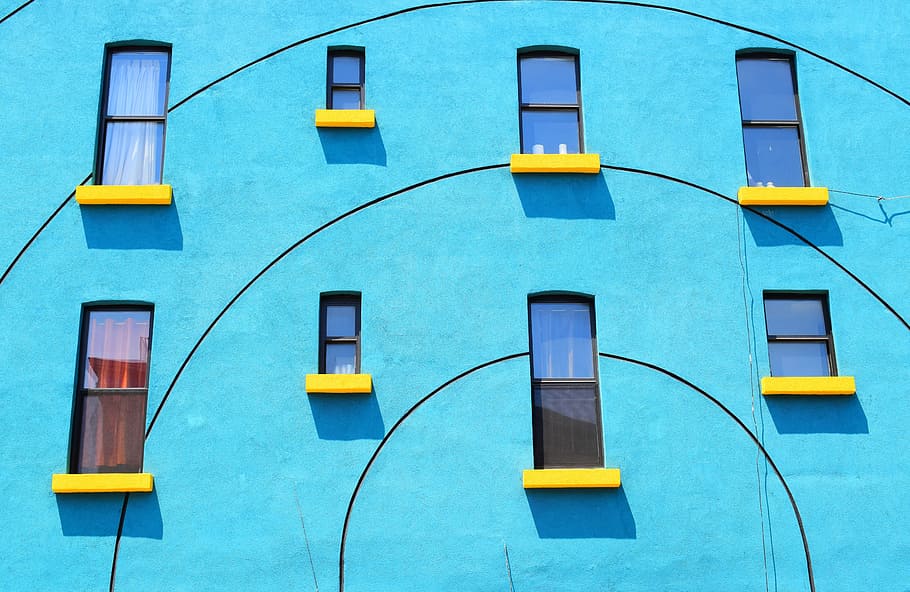 blue painted wall with eight windows, blue and yellow concrete wall HD wallpaper