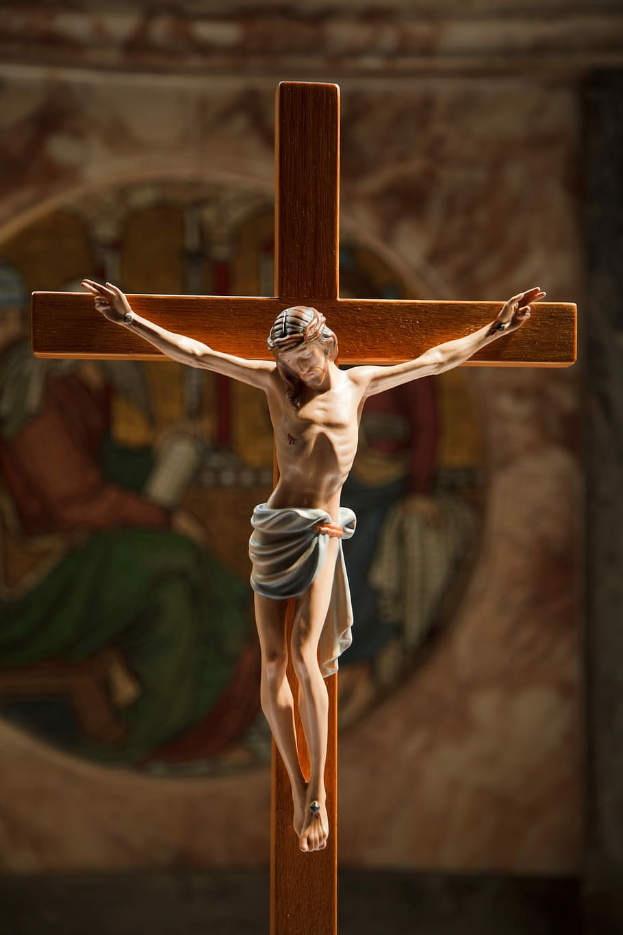 Crucifix decor with ray of light inside room, catholic, christ