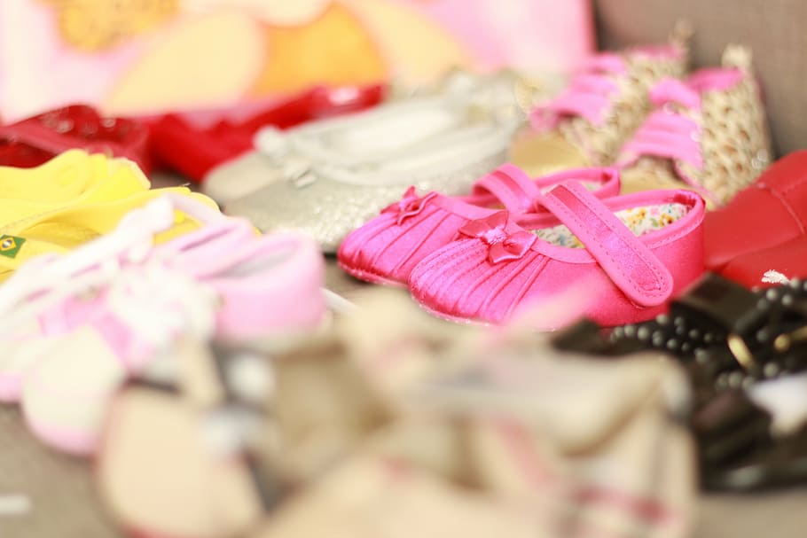 shallow focus photography of girl's shoes, girls shoes, little shoes