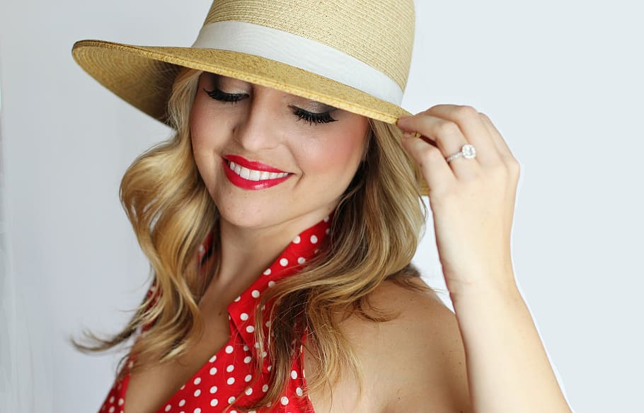 woman wearing red and white polka-dot sleeveless collared tops and brown sun hat, HD wallpaper