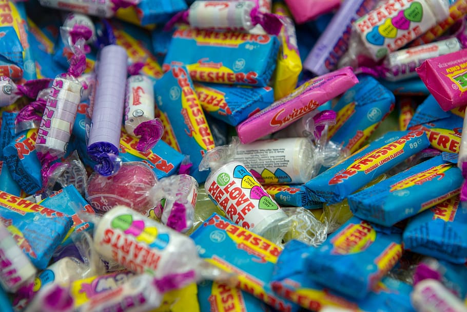 assorted-flavour candies lot, photography of labeled candy packs, HD wallpaper