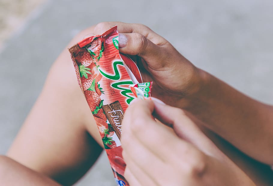 Ice cream, person holding strawberry flavored snacks, hand, open HD wallpaper